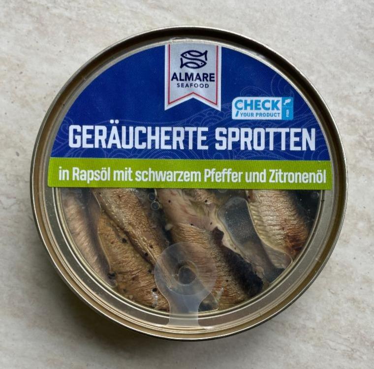 Fotografie - Geräucherte Sprotten in Rapsöl mit schwarzen Pfeffer und Zitronenöl Almare Seafood