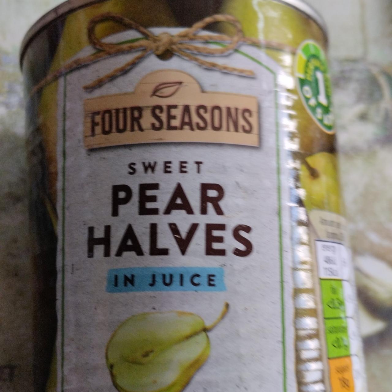 Fotografie - Sweet pear halves in juice Four Seasons