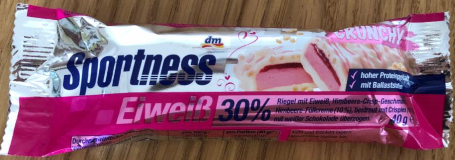 Fotografie - Eiweiß Riegel 30% Himbeere Crisp (proteinová tyčinka s příchutí crispy malina) Sportness