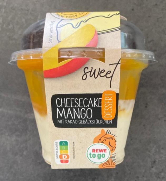 Fotografie - Cheesecake Mango Dessert mit Kakao-Gebäckstückchen Rewe to go