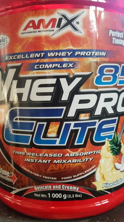 Fotografie - WheyPro Elite Pinacolada Amix Nutrition