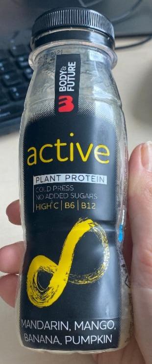 Fotografie - Active plant protein mandarin, mango, banana, pumpkin Body&Future