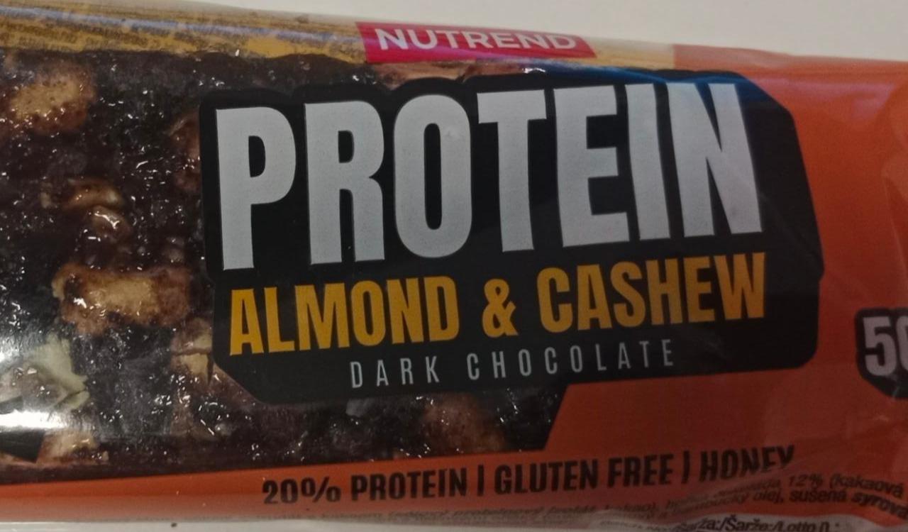 Fotografie - De nuts protein almond & cashew dark chocolate Nutrend