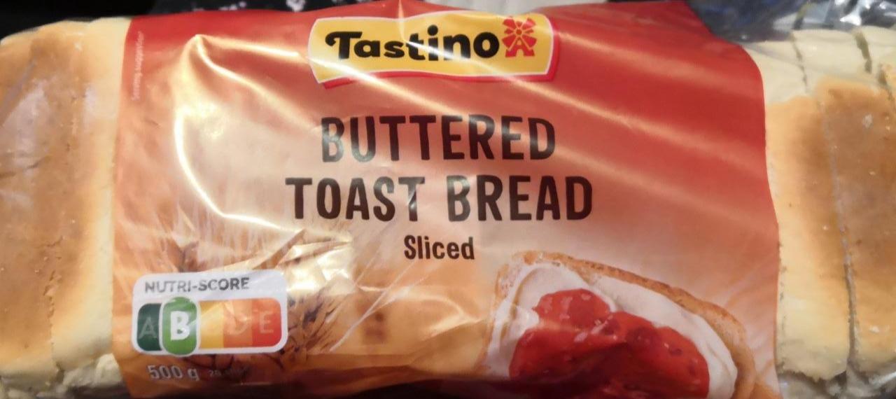 Fotografie - Buttered toast bread sliced Tastino