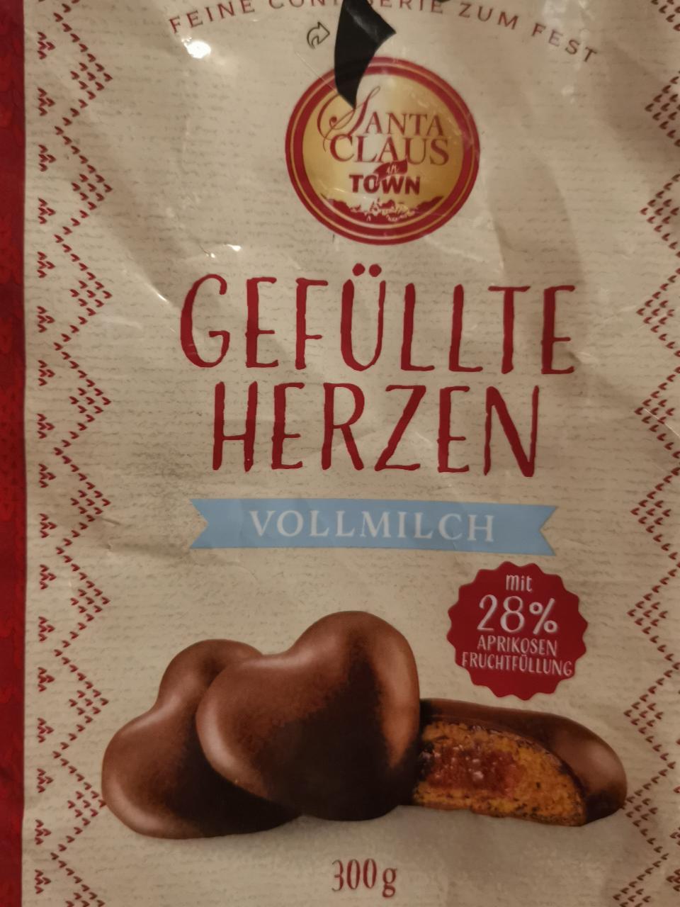 Fotografie - Gefüllte Herzen Vollmilch mit 28% Aprikosen Fruchtfüllung Santa Claus in Town