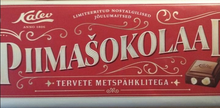 Fotografie - Piimašokolaad tervete röstitud metspähklitega Kalev